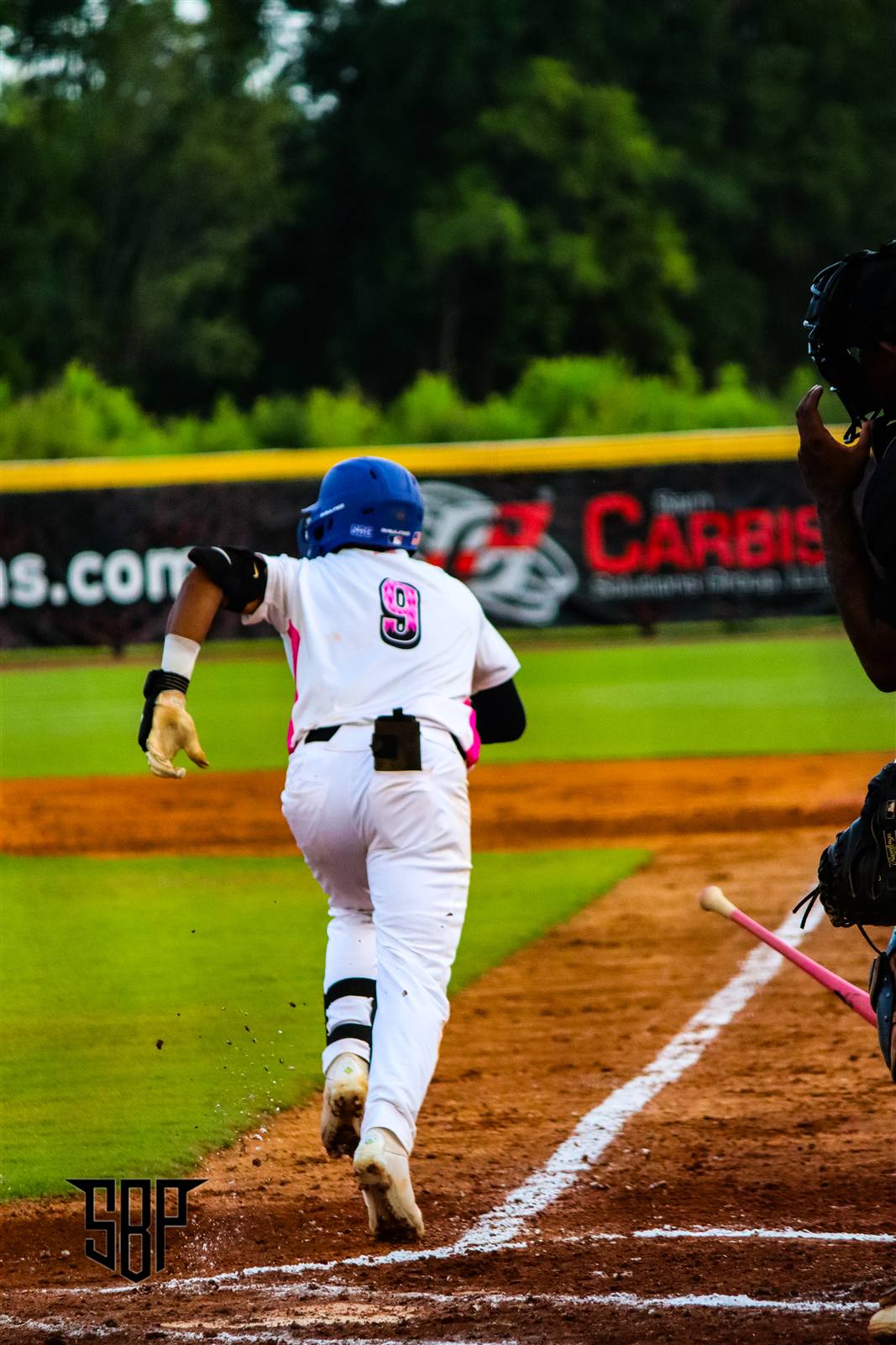 Baseball player rounding the bases